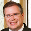 Headshot of Tom Arnold